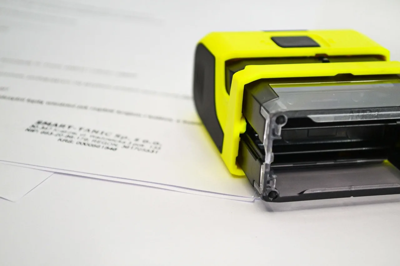 stamp, rubber stamp, documents, paperwork, stamp, stamp, stamp, stamp, stamp, rubber stamp. Handling Illinois paid leave and Washington PFML in an employee handbook template